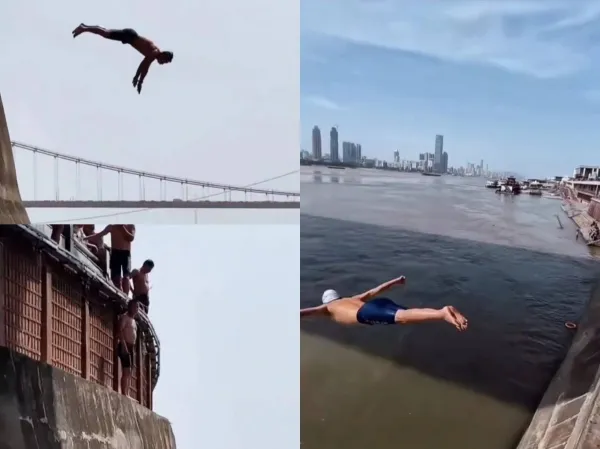 男子在长江大桥下方跳水